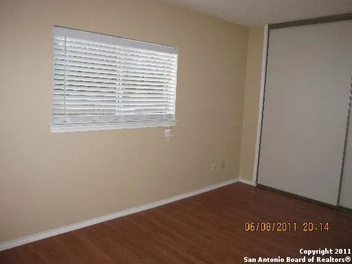 a bathroom with a sink toilet and a mirror