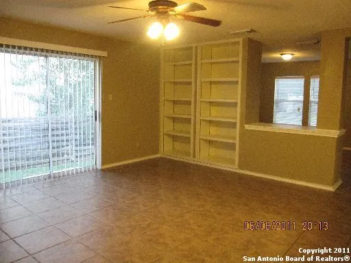 a kitchen with a sink and a stove top oven