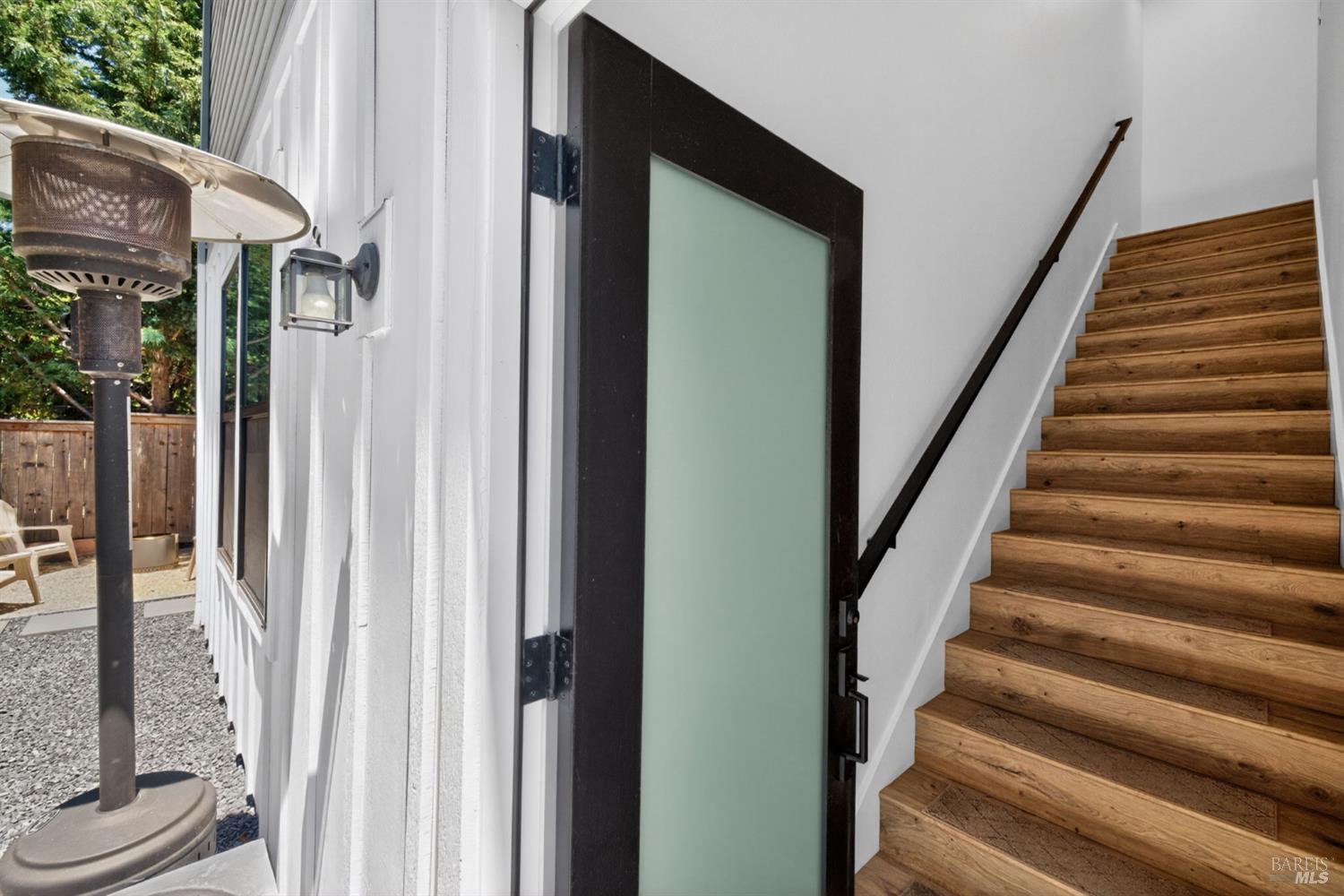 2215-2217 Versaro Drive Santa Rosa, CA 95403 - Photo 29 of 45 a view of staircase with wooden floor and a potted plant