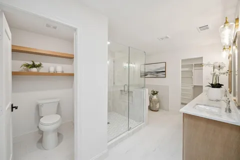 a bath room with a bathtub and a shower
