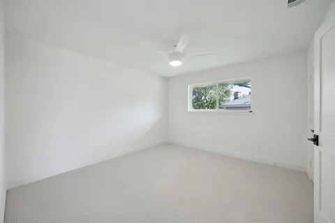 a bathroom with a toilet a sink and bathtub