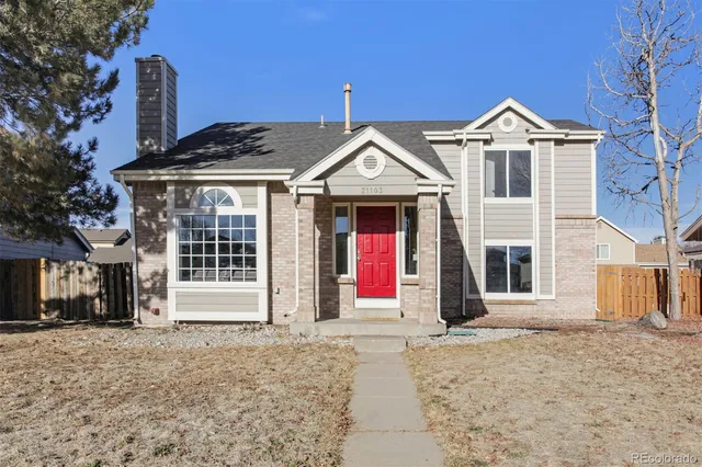 a front view of a house with a porch