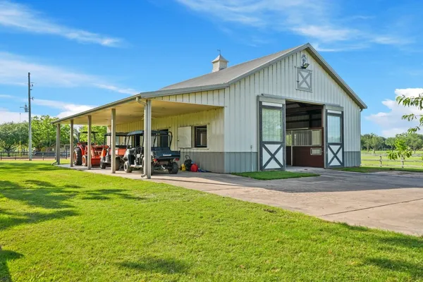 a view of a backyard of a house