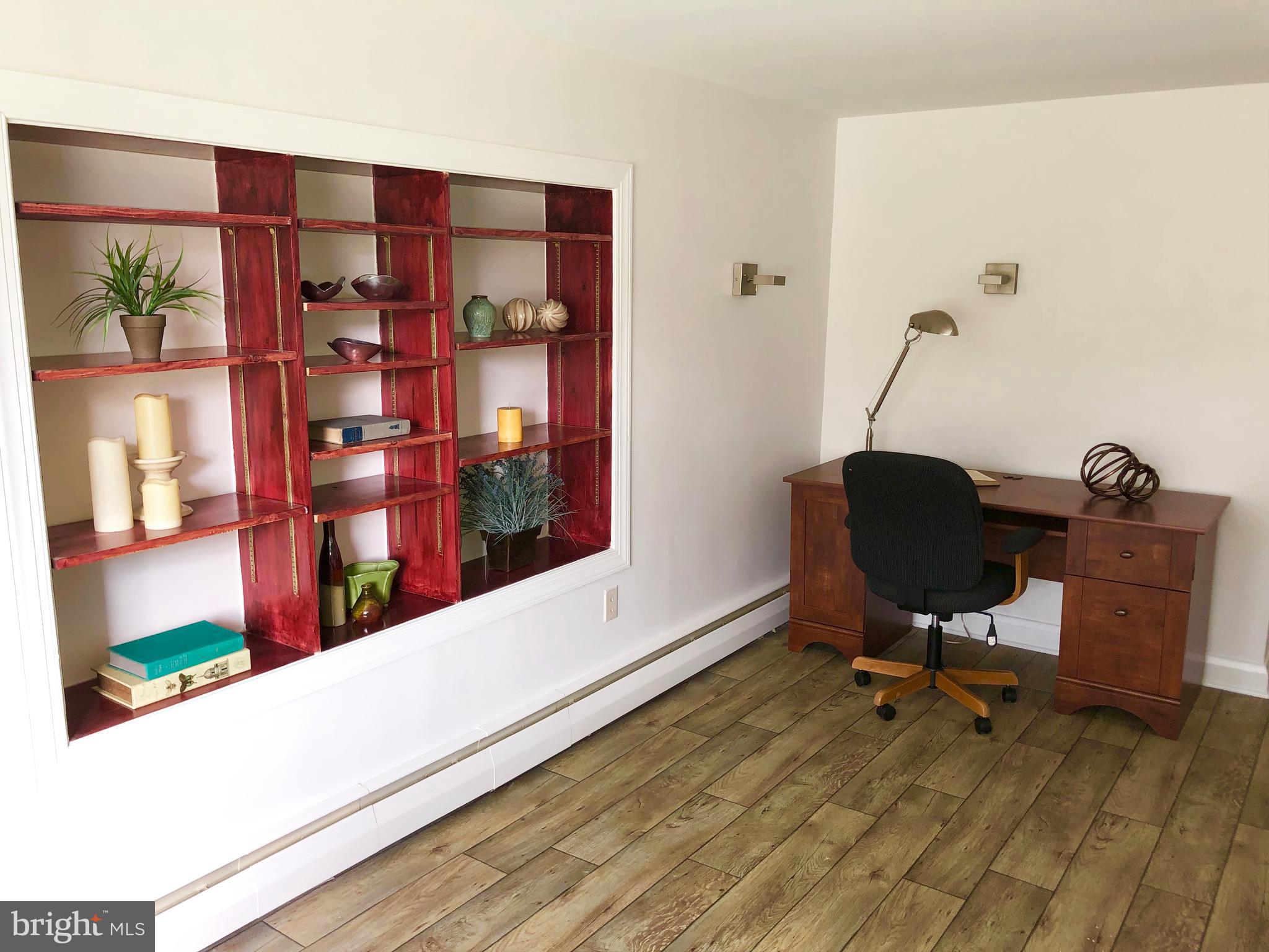 1908 Clifden Road Baltimore, MD 21228 - Photo 22 of 47 Family Room with Built-In Shelving