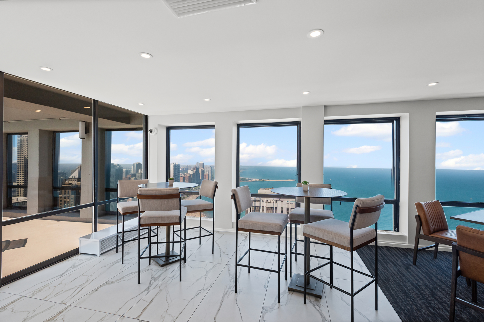 260 East Chestnut Street, Unit 611 Chicago, IL 60611 - Photo 14 of 20 a dining room with furniture and wooden floor