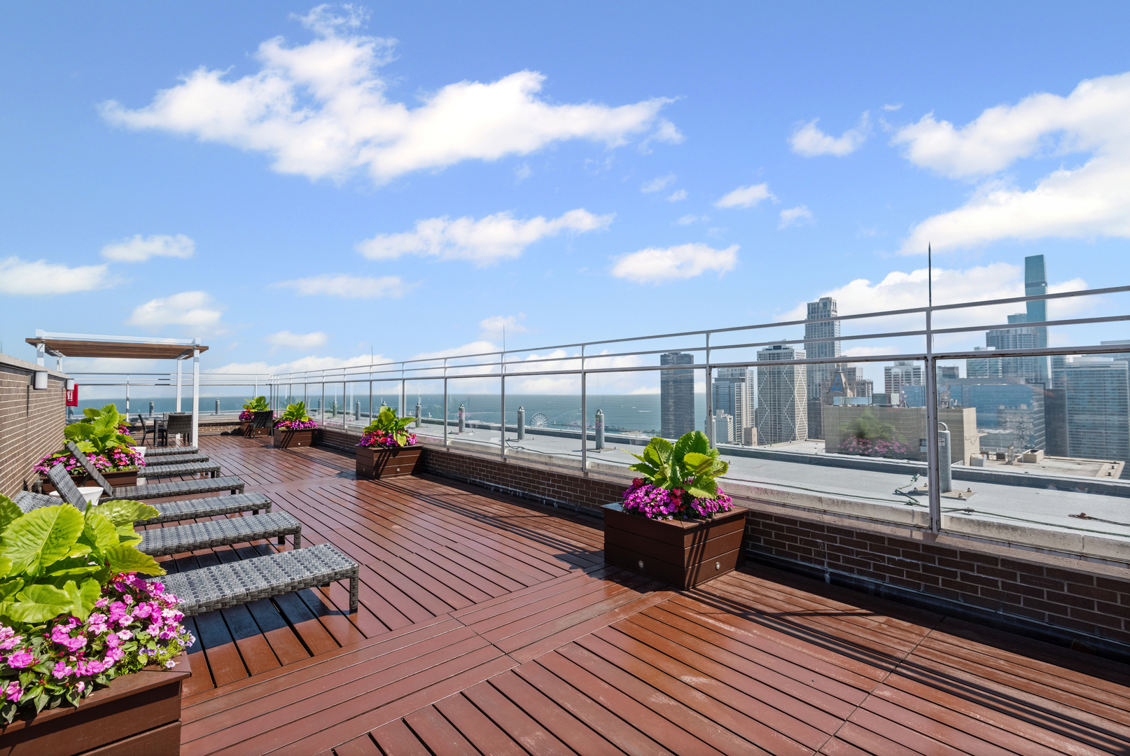 260 East Chestnut Street, Unit 611 Chicago, IL 60611 - Photo 17 of 20 a view of a chairs and tables in the balcony