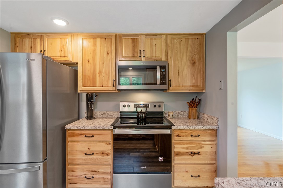 8069 Princess Path Clay, NY 13090 - Photo 13 of 50 New stainless steel appliances.