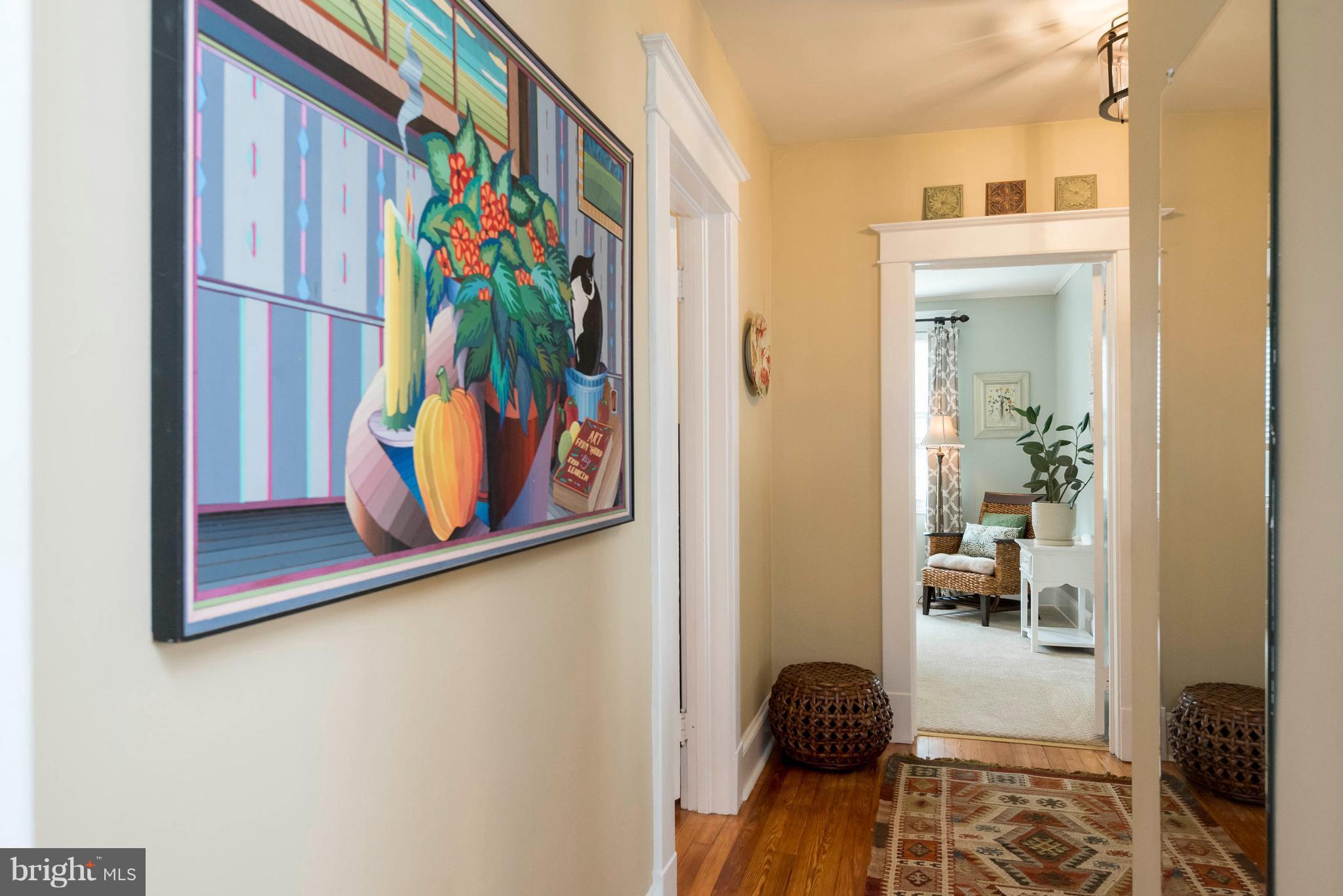 3 Mallow Hill Road Baltimore, MD 21229 - Photo 18 of 30 a view of a hallway with wooden floor and a bedroom