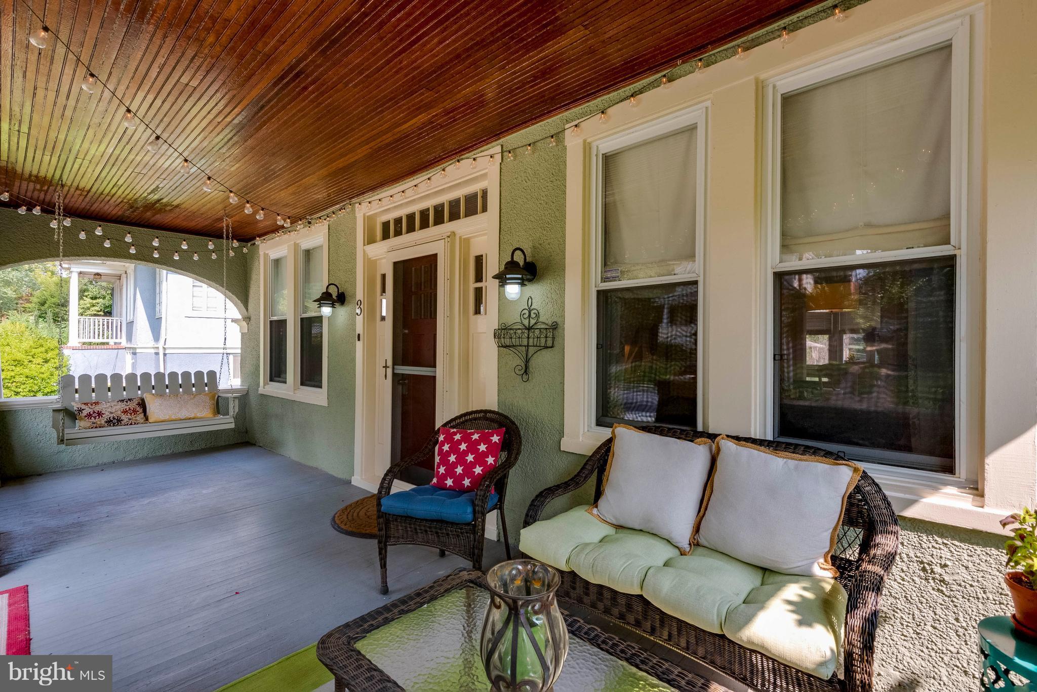 3 Mallow Hill Road Baltimore, MD 21229 - Photo 26 of 30 a outdoor living space with furniture and a potted plant