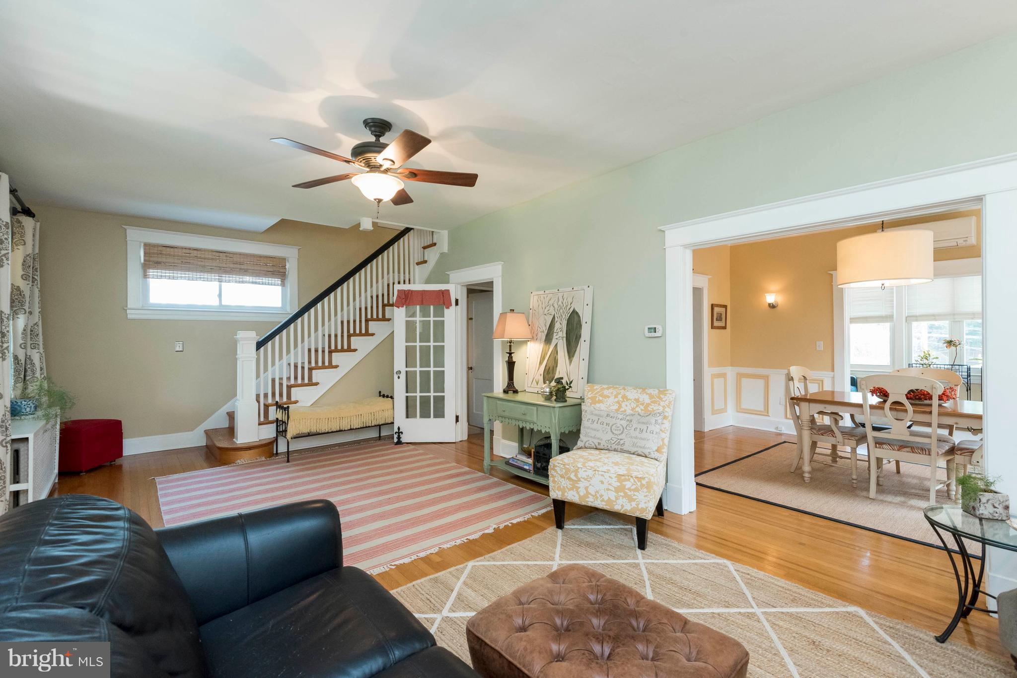 3 Mallow Hill Road Baltimore, MD 21229 - Photo 5 of 30 a living room with furniture and a chandelier
