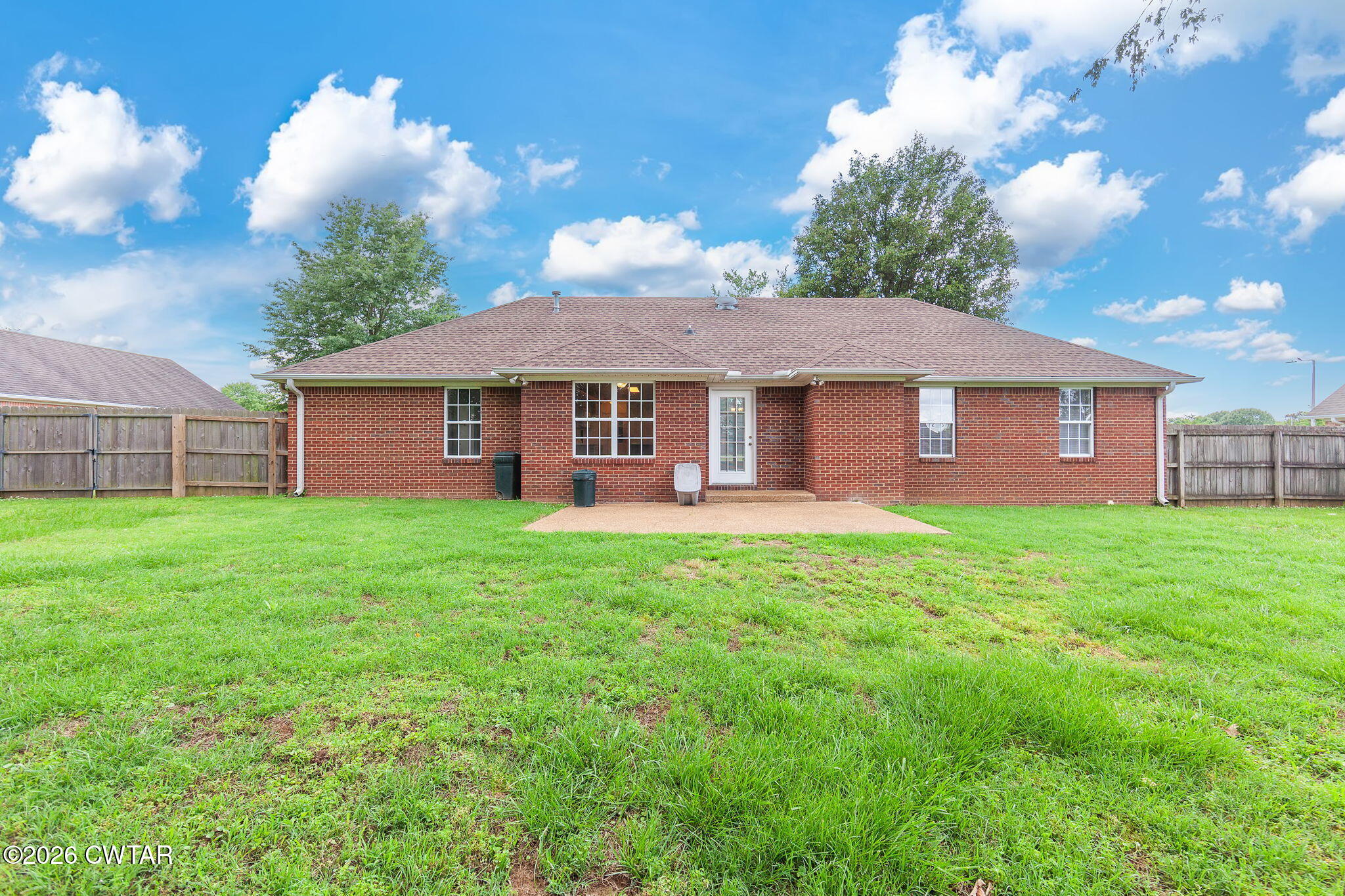 96 Sundown Drive Jackson, TN 38305 - Photo 23 of 28 a view of a house with a garden