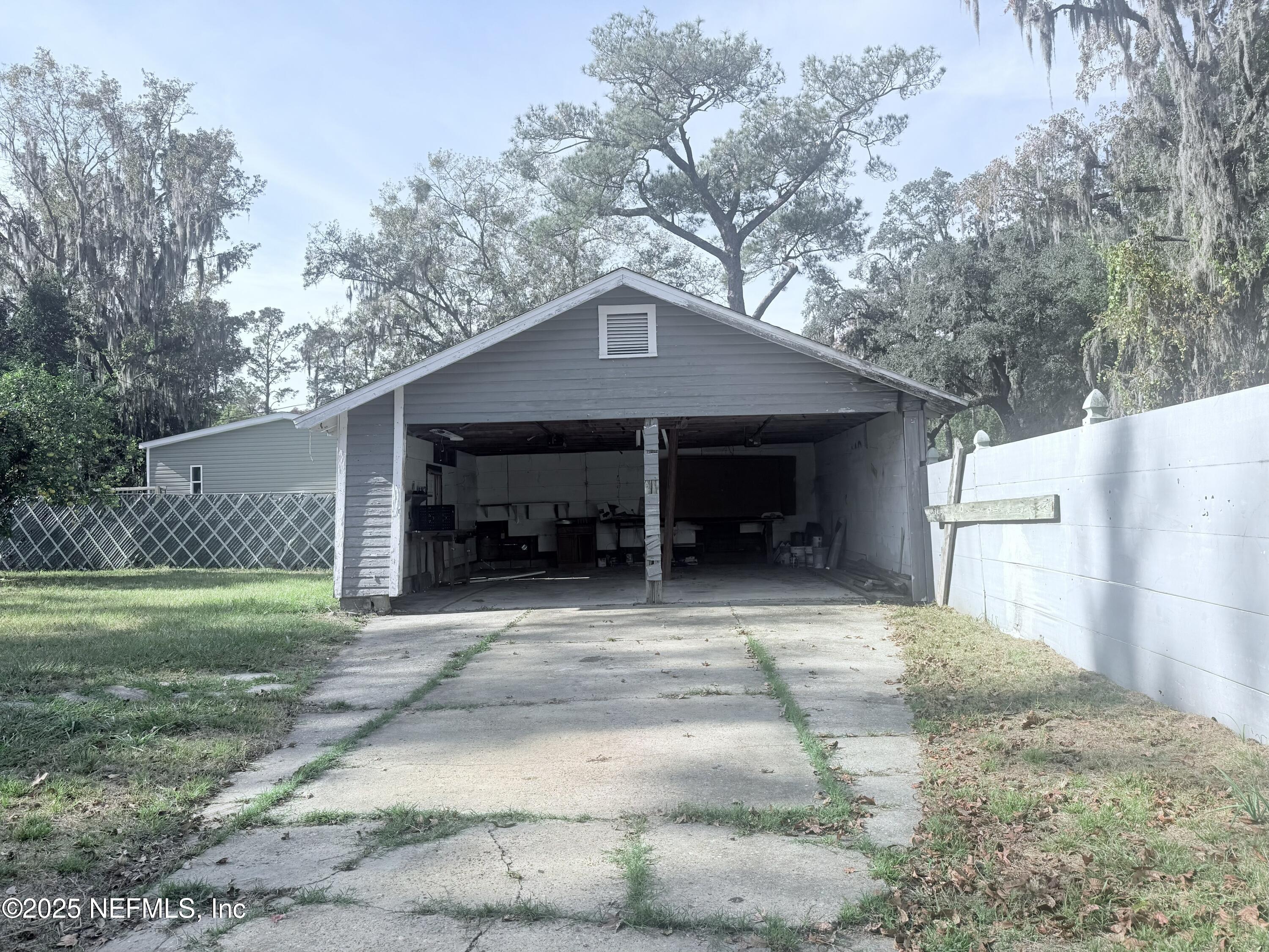10728 Old Kings Road Jacksonville, FL 32219 - Photo 20 of 27 a house view with a outdoor space