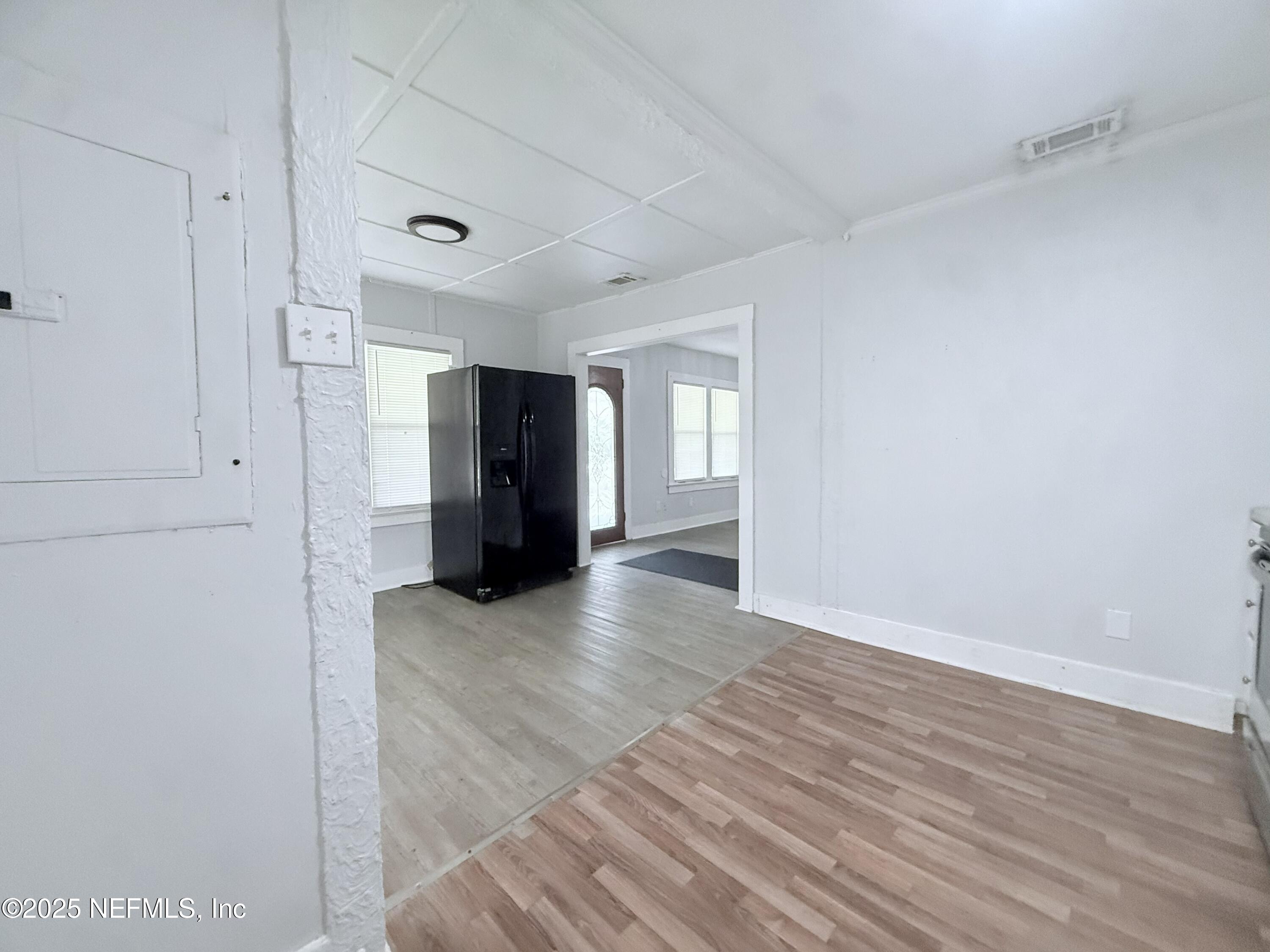 10728 Old Kings Road Jacksonville, FL 32219 - Photo 10 of 27 a view of livingroom with an empty space and a window