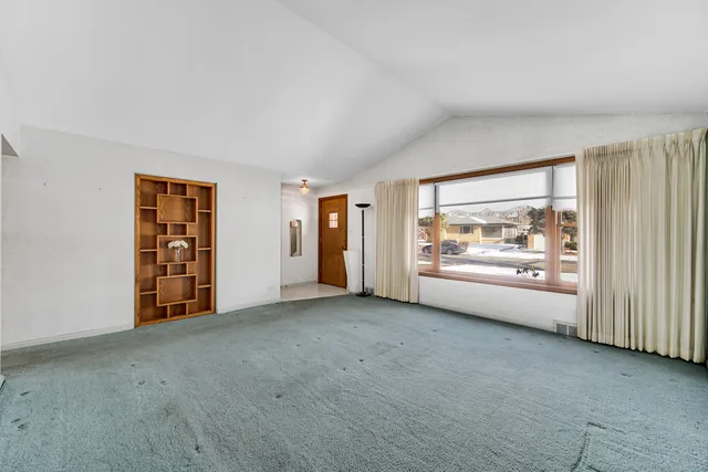 an empty room with window