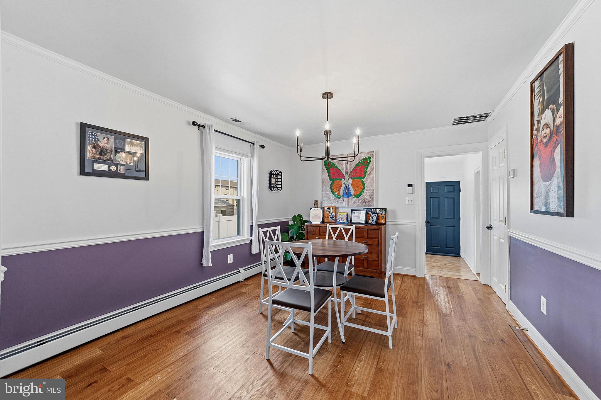 15 South Clinton Avenue Maple Shade, NJ 08052 - Photo 12 of 29 a view of a dining room with furniture and wooden floor