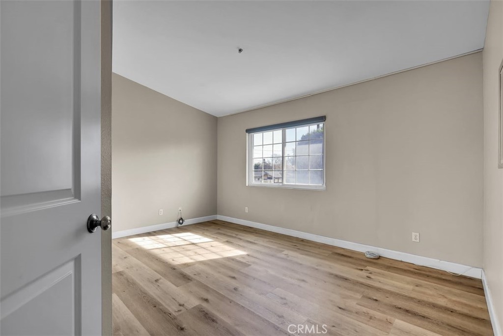 755 North East Street Anaheim, CA 92805 - Photo 11 of 31 a view of an empty room with wooden floor and a window