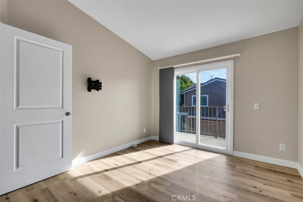 755 North East Street Anaheim, CA 92805 - Photo 14 of 31 a view of empty room with wooden floor and fan