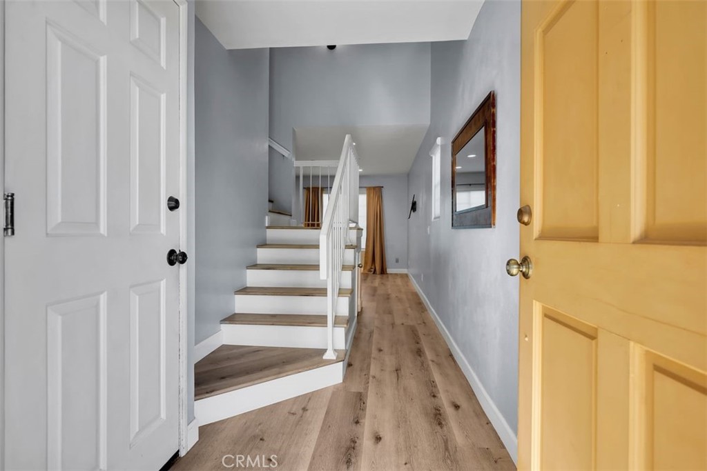 755 North East Street Anaheim, CA 92805 - Photo 28 of 31 a view of a hallway with wooden floor and entryway