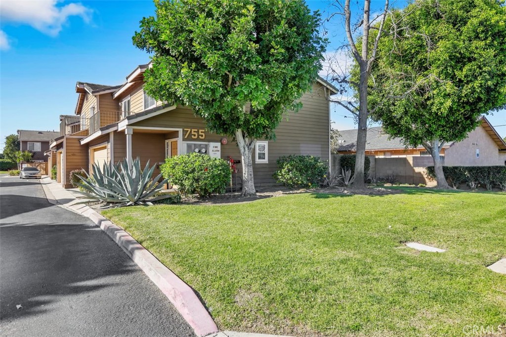755 North East Street Anaheim, CA 92805 - Photo 30 of 31 a front view of house with yard and green space