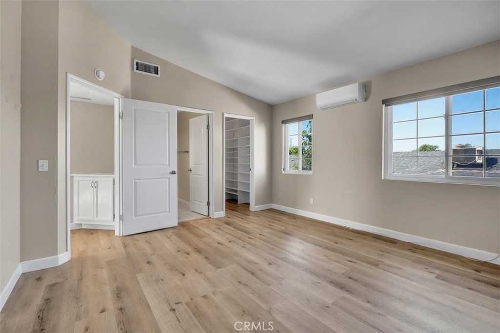 755 North East Street Anaheim, CA 92805 - Photo 6 of 31 wooden floor in an empty room with a window