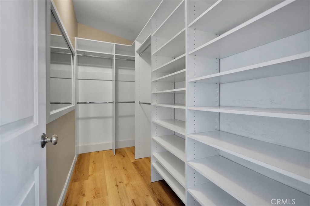 755 North East Street Anaheim, CA 92805 - Photo 7 of 31 a view of walk in closet with empty racks