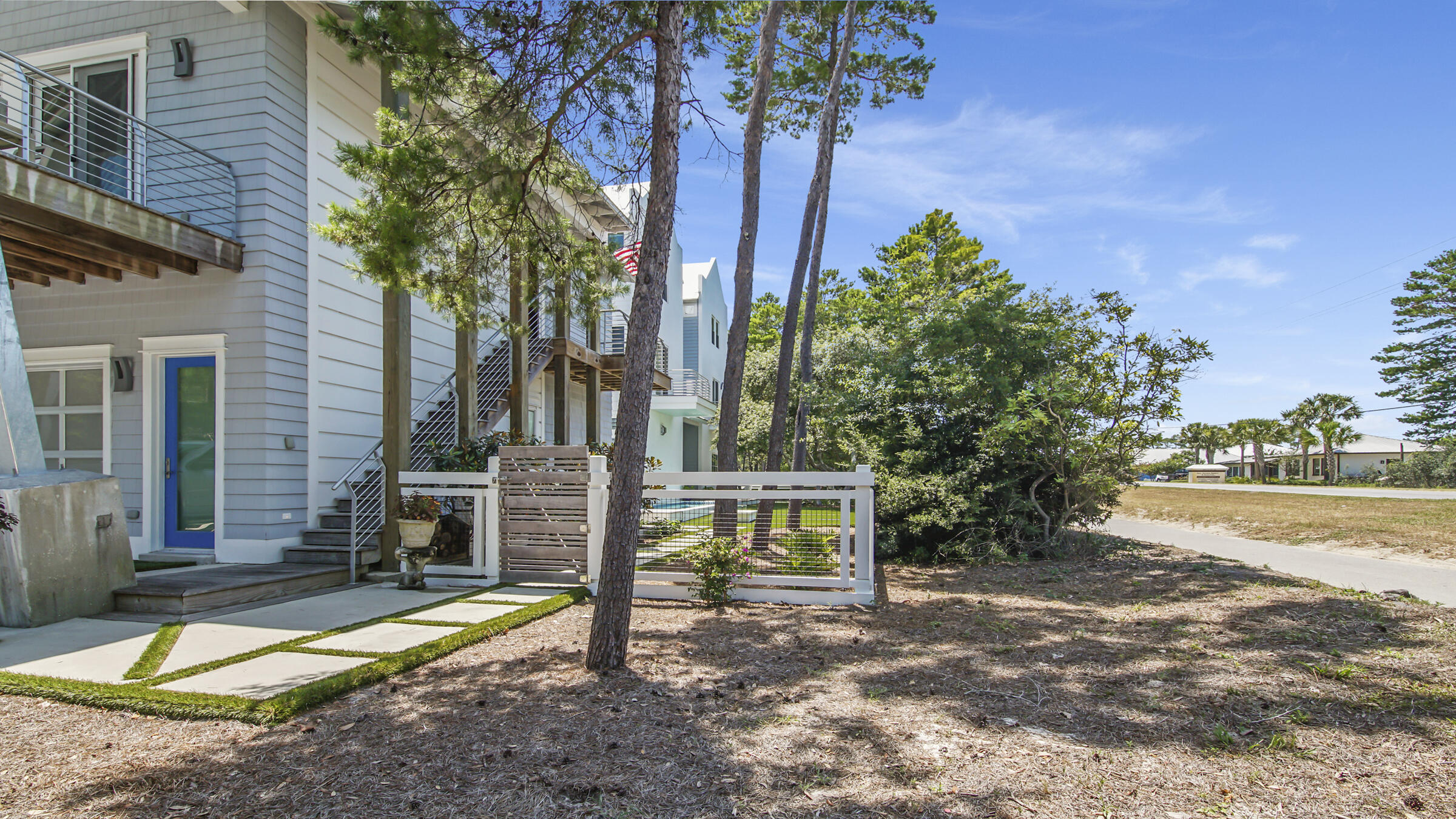16 South Lake Drive Santa Rosa Beach, FL 32459 - Photo 56 of 70 a view of a house with backyard and a patio