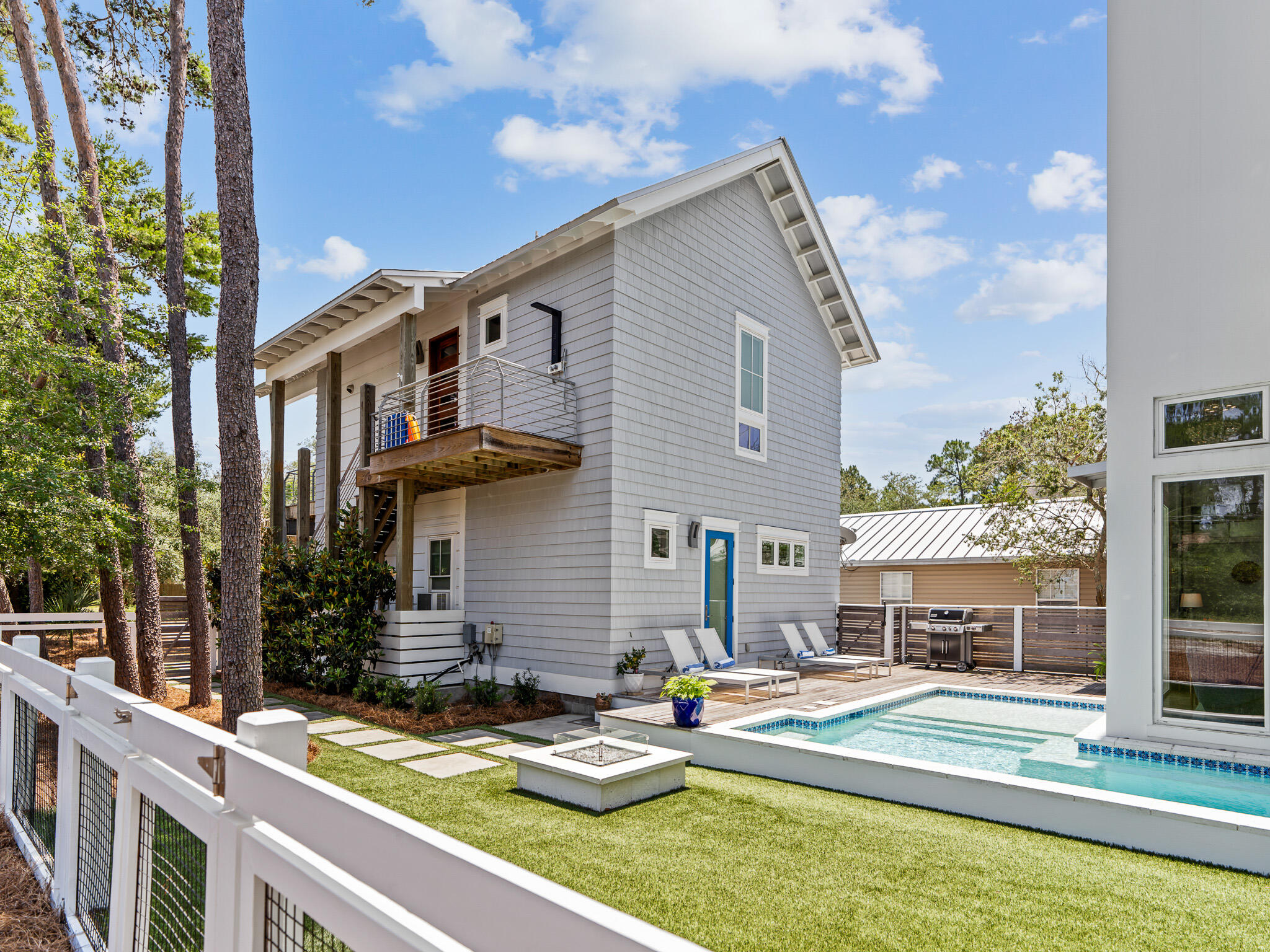 16 South Lake Drive Santa Rosa Beach, FL 32459 - Photo 58 of 70 a view of a house with pool and chairs