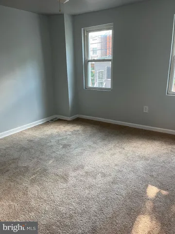 a view of a room with rack on the wall