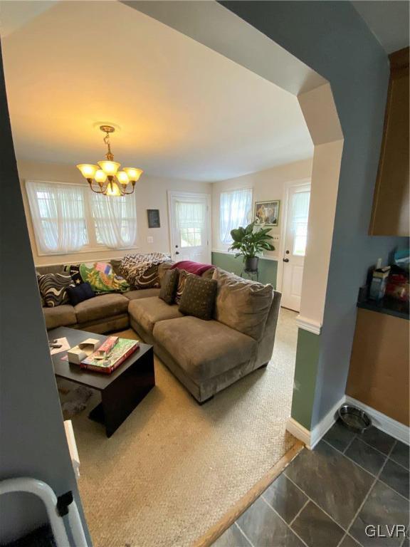 535 Forrest Avenue Bethlehem, PA 18017 - Photo 8 of 16 a living room with furniture and a chandelier