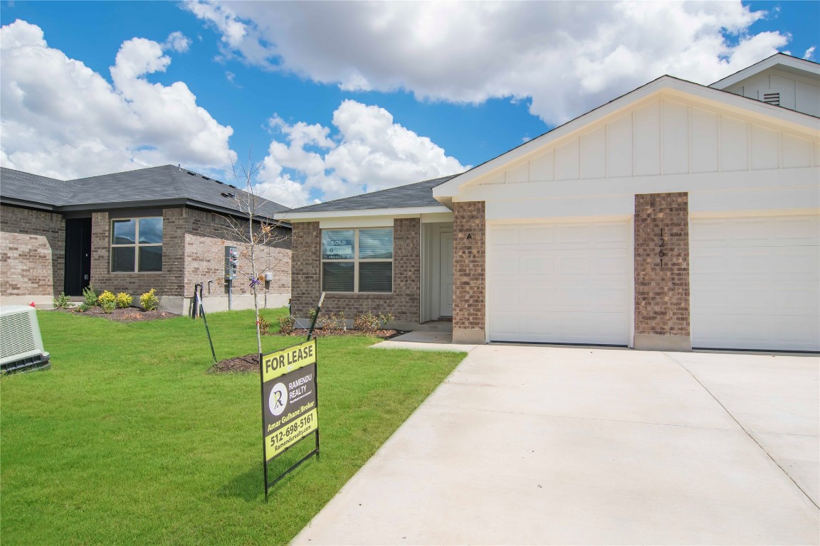1261 Lehmann Drive, Unit A Copperas Cove, TX 76522 - Photo 1 of 18 a view of a house with backyard and a garden