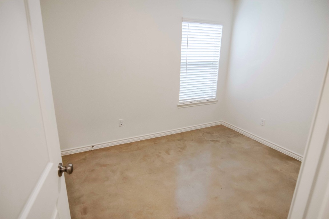 1261 Lehmann Drive, Unit A Copperas Cove, TX 76522 - Photo 13 of 18 an empty room with a window