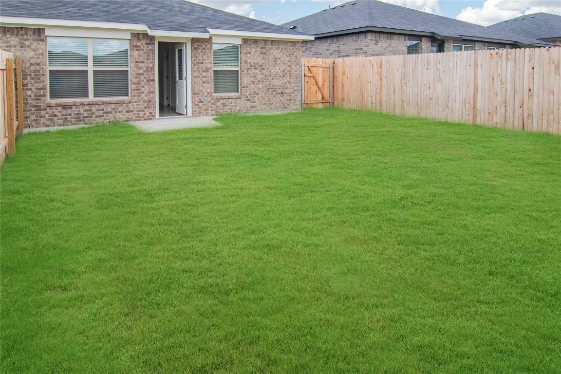 1261 Lehmann Drive, Unit A Copperas Cove, TX 76522 - Photo 17 of 18 a backyard of a house with lots of green space