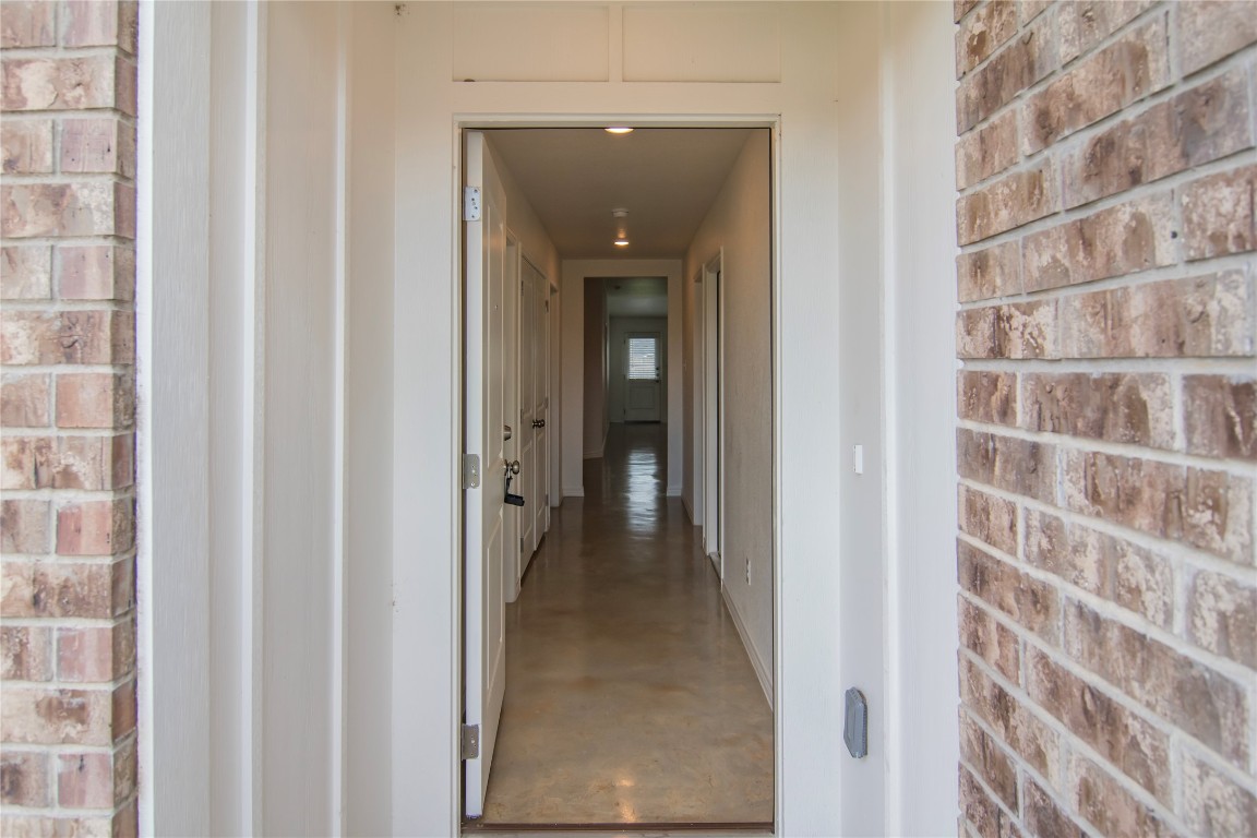 1261 Lehmann Drive, Unit A Copperas Cove, TX 76522 - Photo 6 of 18 a view of a hallway with a door and a wooden floor