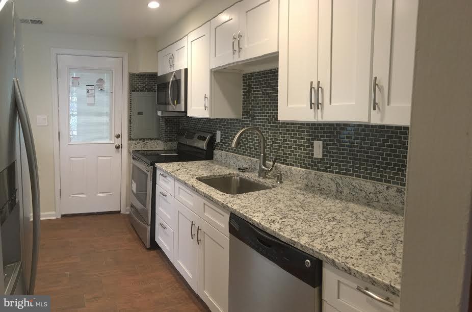 7618 Burnside Road Landover, MD 20785 - Photo 5 of 17 Gourmet kitchen w/ rear patio access