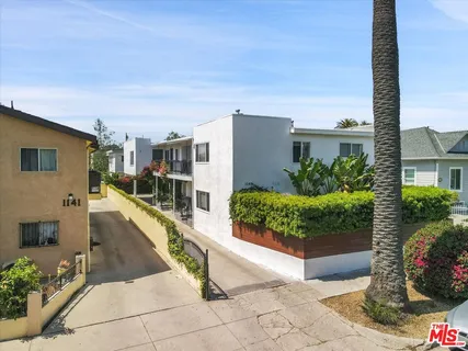 a view of a house with a garden
