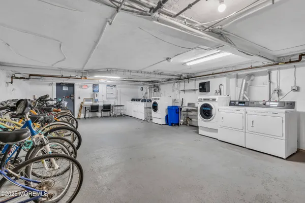 a utility room with lots of appliances and furniture