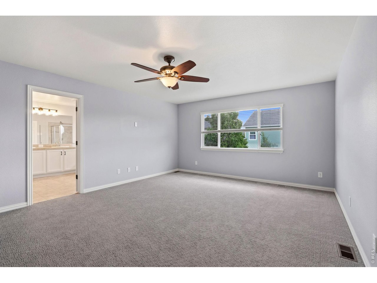 5751 Banner Street Timnath, CO 80547 - Photo 23 of 39 Primary bedroom