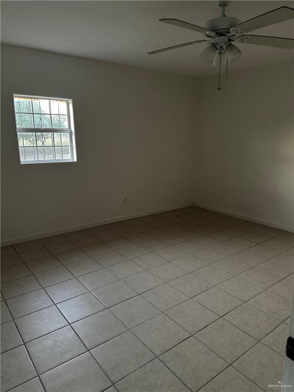 12517 North Taylor Road Mission, TX 78573 - Photo 13 of 22 an empty room with a window