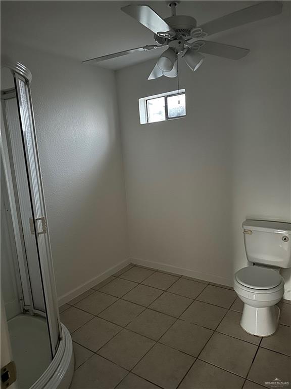 12517 North Taylor Road Mission, TX 78573 - Photo 17 of 22 a bathroom with a toilet and a sink