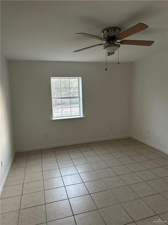 12517 North Taylor Road Mission, TX 78573 - Photo 9 of 22 an empty room with windows