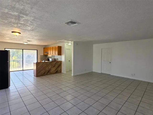 a view of a livingroom with furniture