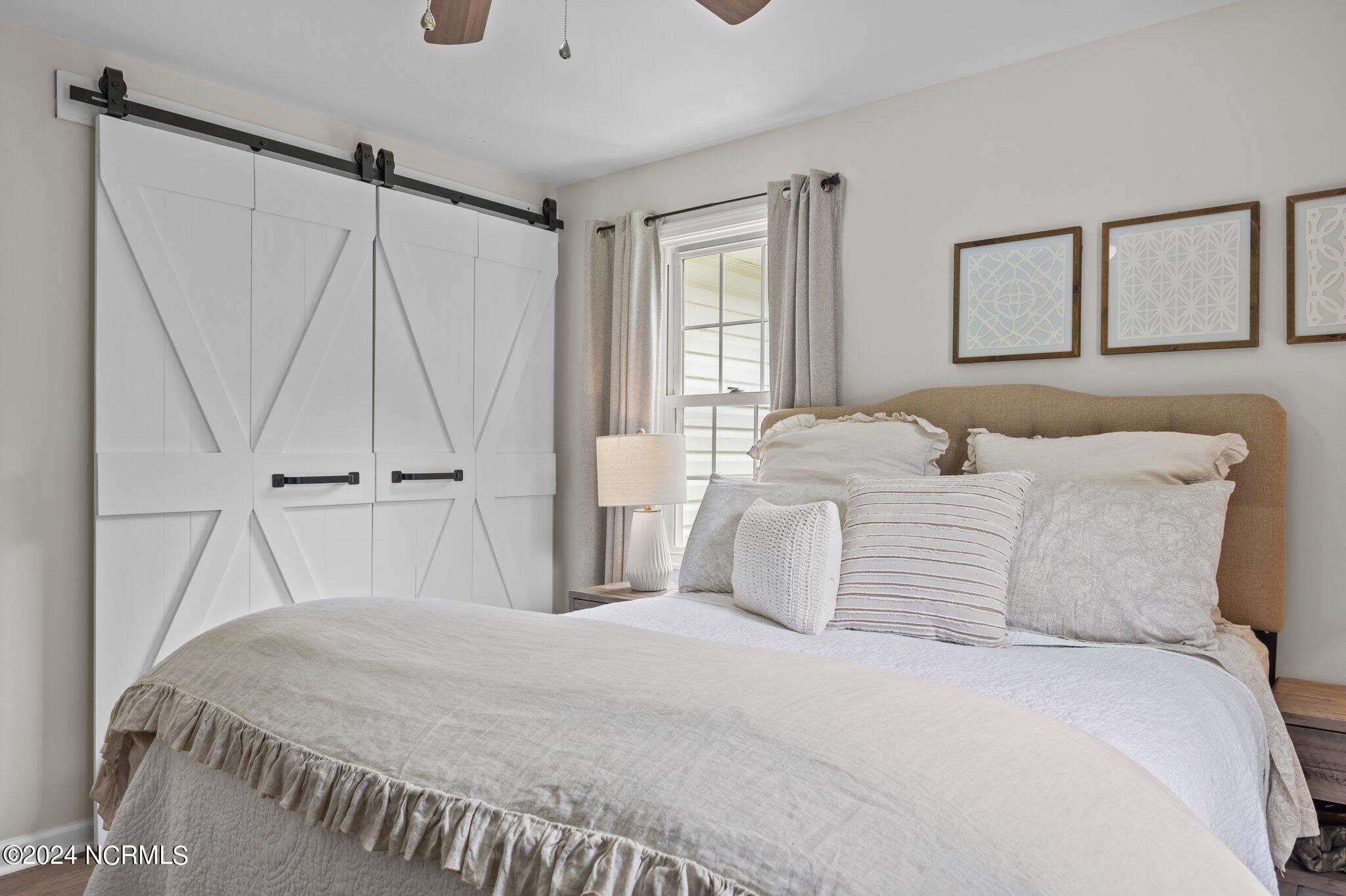 263 Core Creek Road Beaufort, NC 28516 - Photo 14 of 55 farmhouse primary bedroom