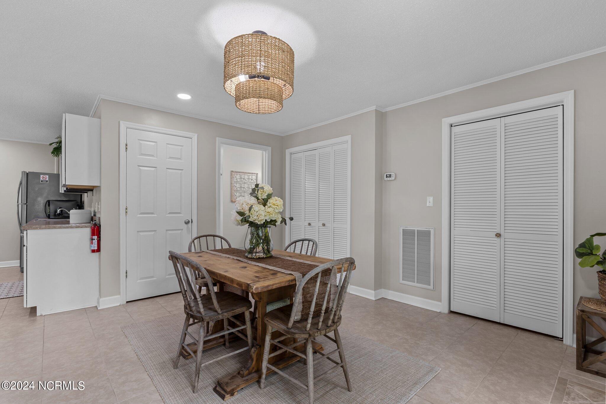263 Core Creek Road Beaufort, NC 28516 - Photo 37 of 55 Bungalow with plenty of closet storage for guests and a pantry closet for the updated kitchen