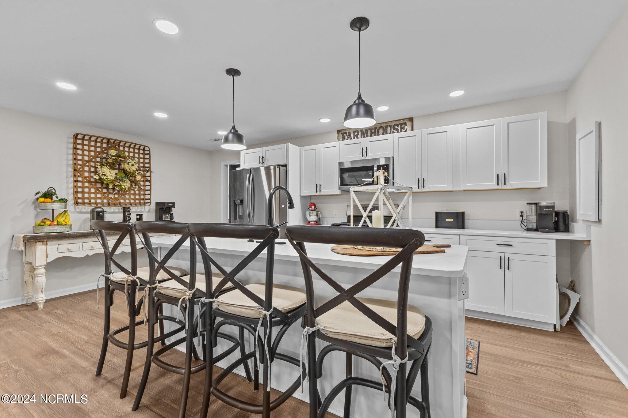 263 Core Creek Road Beaufort, NC 28516 - Photo 9 of 55 farmhouse kitchen with island seating
