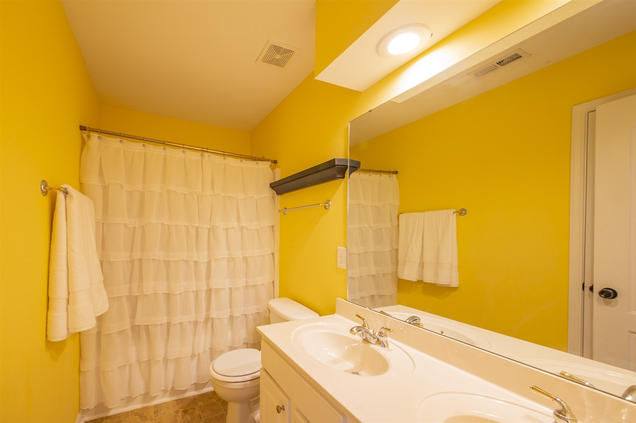 7600 Silver View Lane Raleigh, NC 27613 - Photo 24 of 30 Hall Bathroom