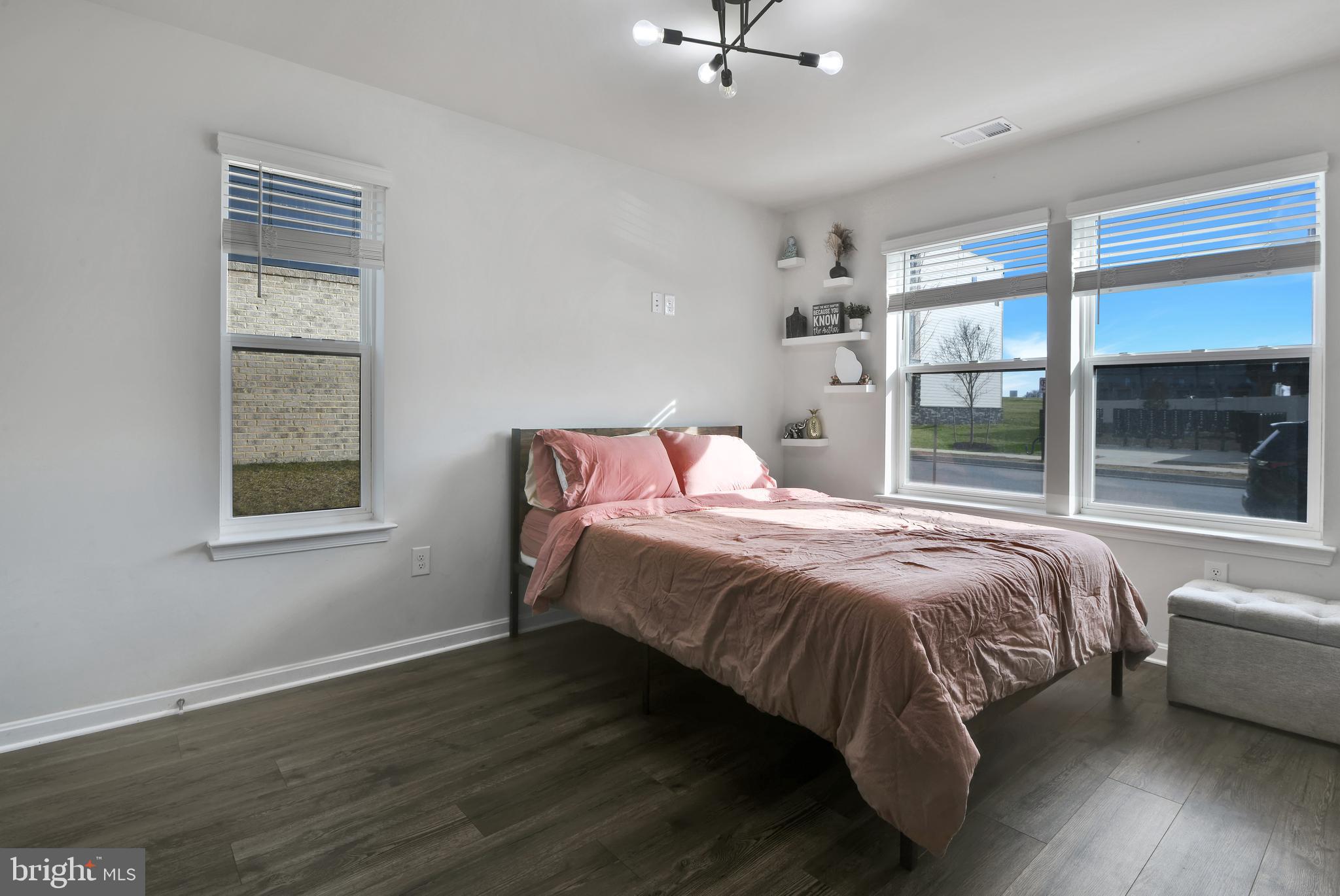 457 Tiller Street Frederick, MD 21701 - Photo 12 of 25 a bedroom with a bed and a window