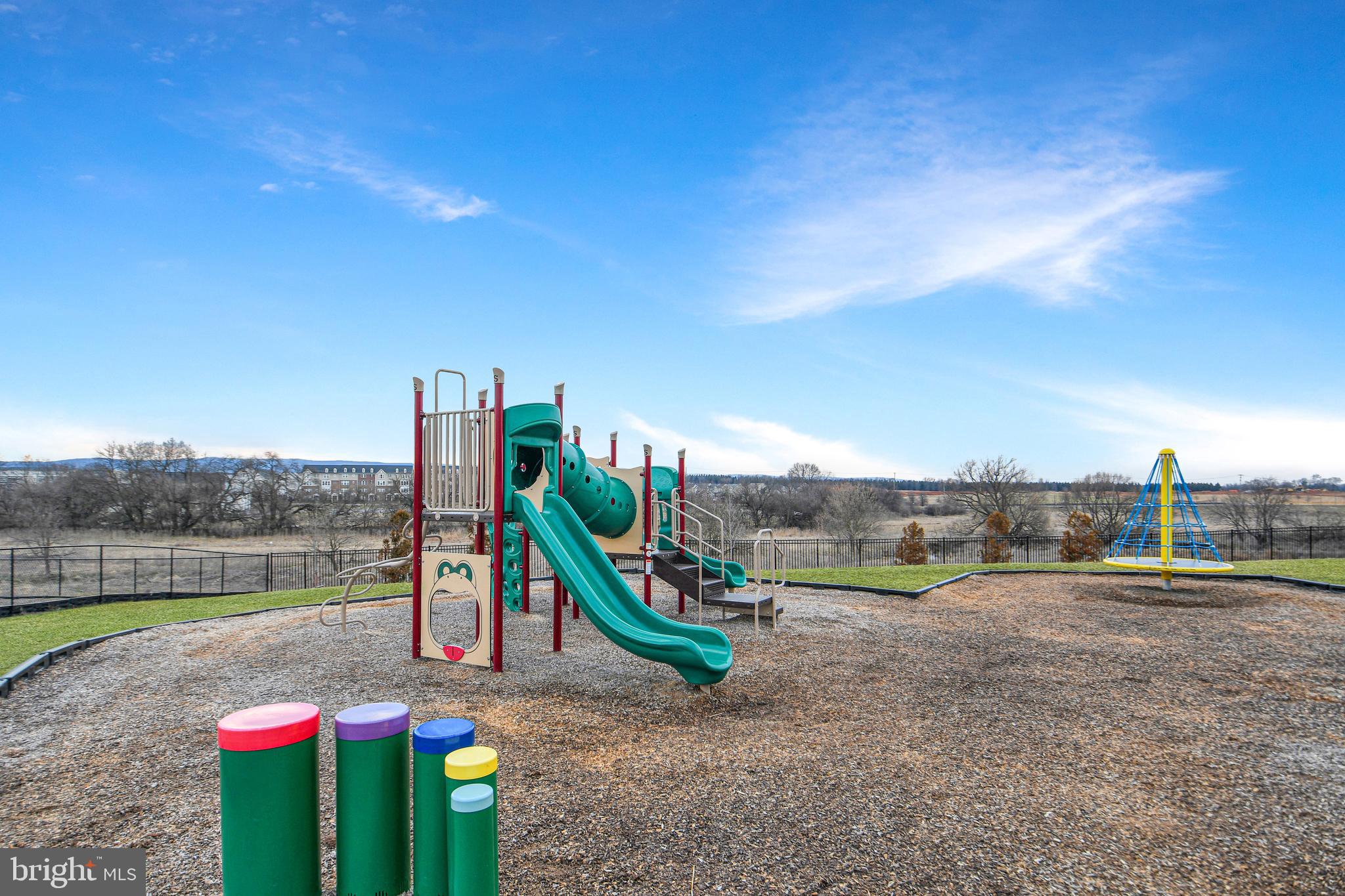 457 Tiller Street Frederick, MD 21701 - Photo 24 of 25 a view of a park with swings and slides