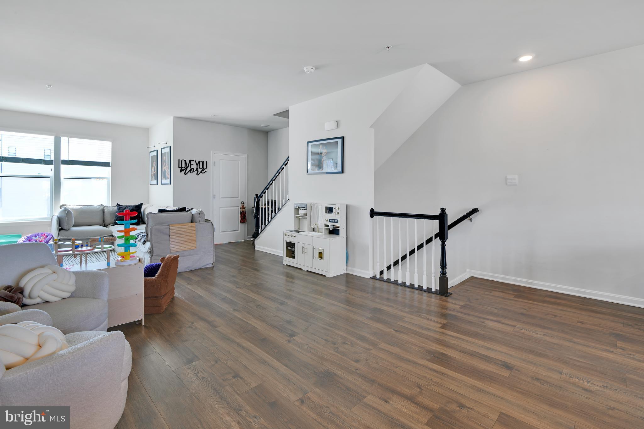 457 Tiller Street Frederick, MD 21701 - Photo 10 of 25 a living room with furniture and wooden floor