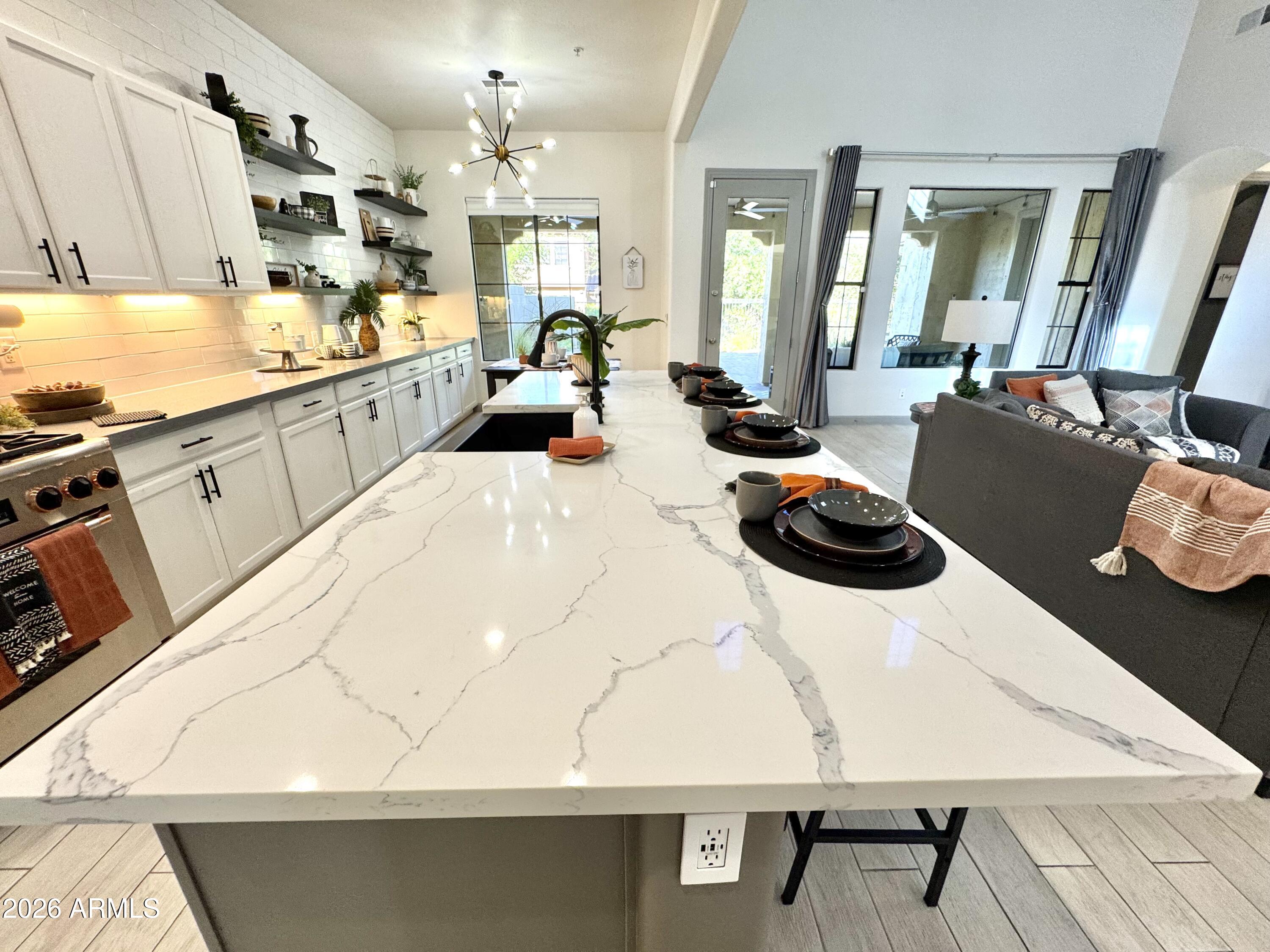 3467 North Hooper Street Buckeye, AZ 85396 - Photo 10 of 96 Featuring quartz countertops