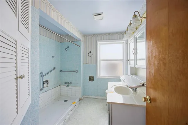 a bathroom with a sink and a toilet